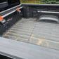 Truck bed tie down system
