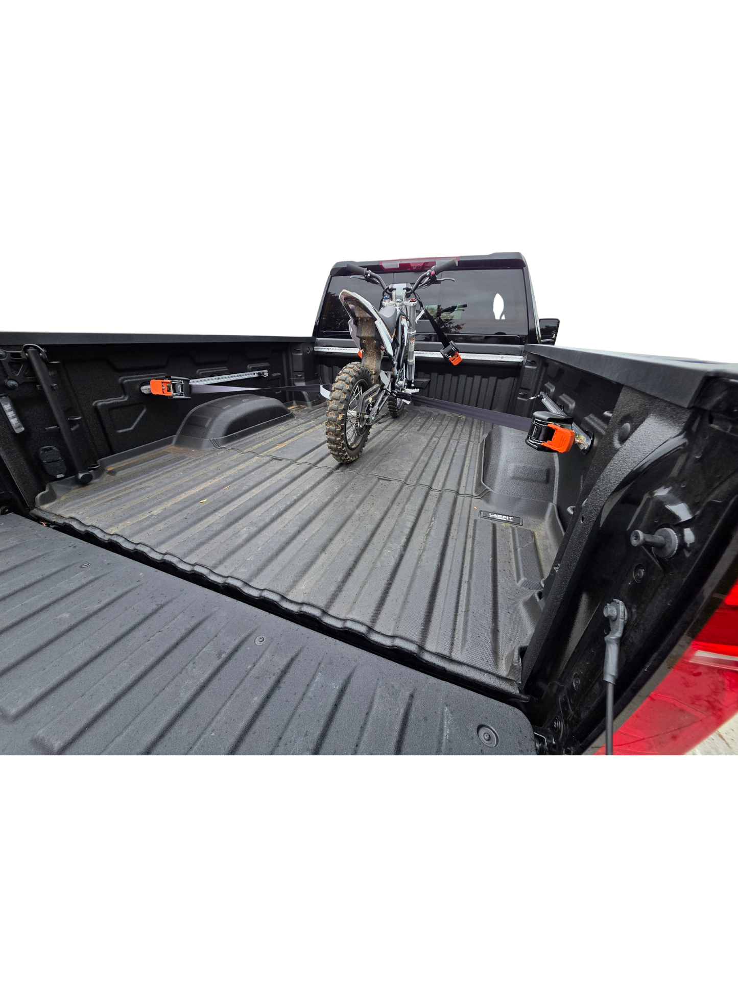 Truck bed tie down system