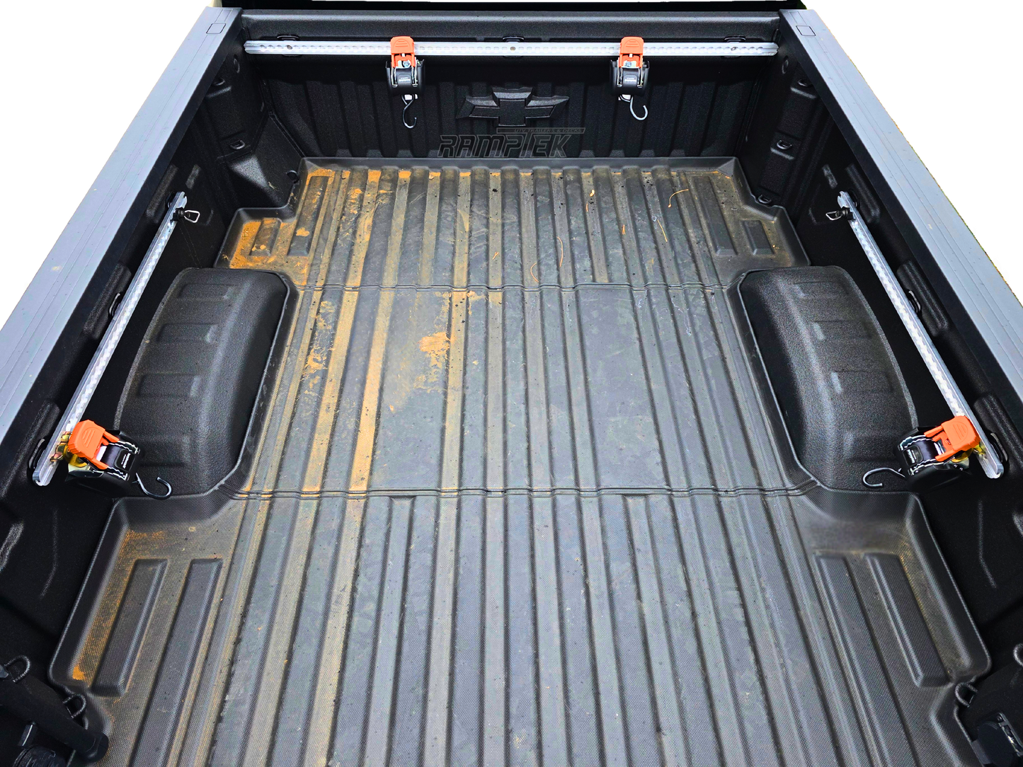Truck bed tie down system